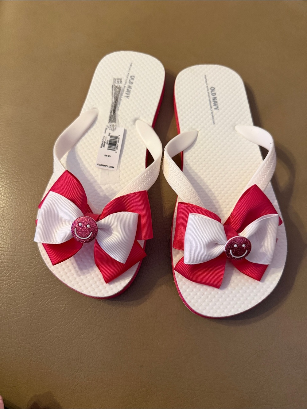 Old Navy White and Hot Pink Bow Flip Flops with Glitter Smile